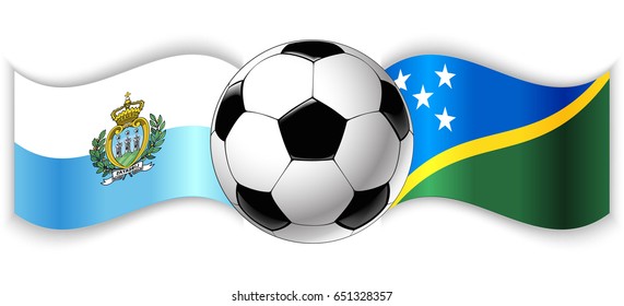 Sammarinese and Solomon Island wavy flags with football ball. San Marino combined with Solomon Islands isolated on white. Football match or international sport competition concept.