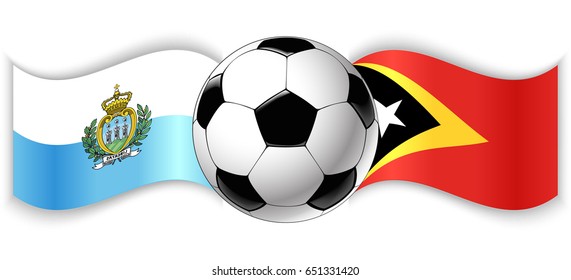 Sammarinese and Timorese wavy flags with football ball. San Marino combined with East Timor isolated on white. Football match or international sport competition concept.