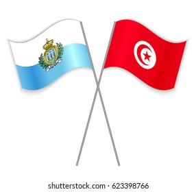 Sammarinese and Tunisian crossed flags. San Marino combined with Tunisia isolated on white. Language learning, international business or travel concept.