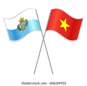 Sammarinese and Vietnamese crossed flags. San Marino combined with Vietnam isolated on white. Language learning, international business or travel concept.