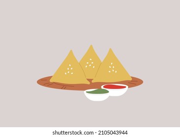 A samosa plate with sauces, a traditional fried snack