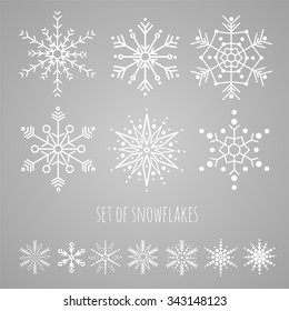 A sample of isolated snowflakes for Christmas cards. Vector.