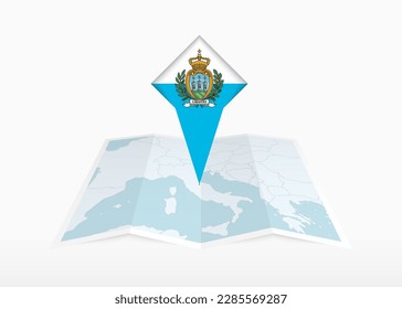 San Marino is depicted on a folded paper map and pinned location marker with flag of San Marino. Folded vector map.