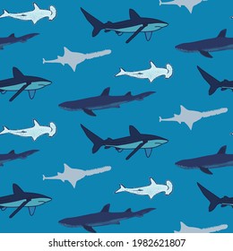 Sand bar shark, hammerhead shark in light and dark blue. Designed in seamless repeat pattern. Ready to be printed on fabric, wall paper or children's bedroom decor. 