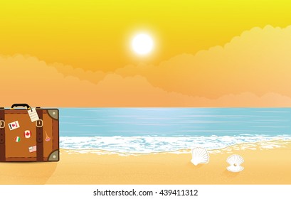 sand and beach with sunset and half a suitcase.