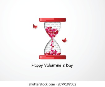A sand clock filled with red hearts symbolizing love and time for Valentine’s Day celebration.