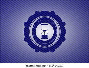 sand clock icon with denim texture