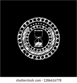 sand clock icon drawn on blackboard