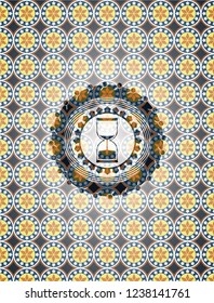 sand clock icon inside arabesque emblem background. arabic decoration.