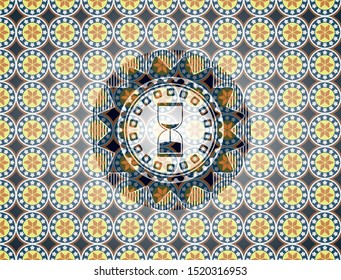 sand clock icon inside arabesque style emblem. arabic decoration.