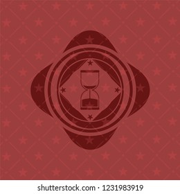 sand clock icon inside badge with red background