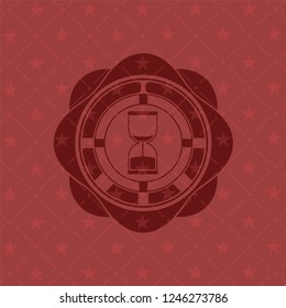 sand clock icon inside badge with red background