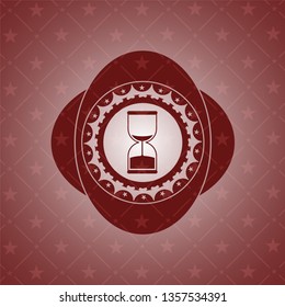 sand clock icon inside badge with red background