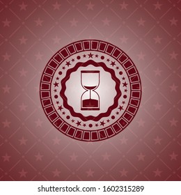 sand clock icon inside badge with red background