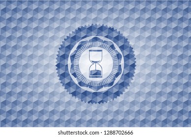 sand clock icon inside blue hexagon emblem.