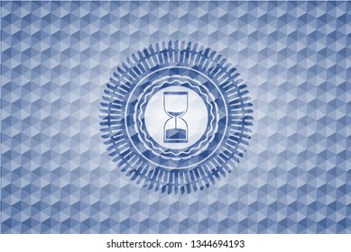 sand clock icon inside blue emblem with geometric pattern.