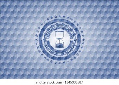 sand clock icon inside blue emblem or badge with abstract geometric pattern background.