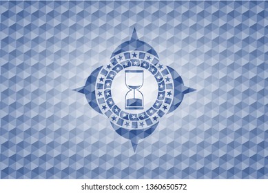 sand clock icon inside blue polygonal emblem.
