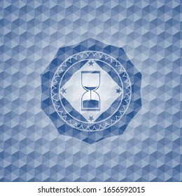 sand clock icon inside blue badge with geometric background.