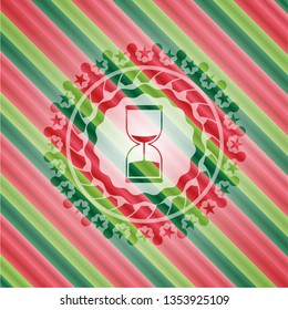 sand clock icon inside christmas emblem background.
