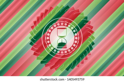 sand clock icon inside christmas colors style emblem.