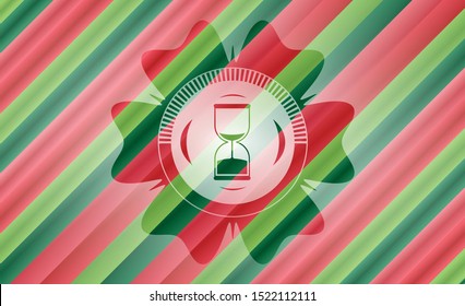 sand clock icon inside christmas emblem background.