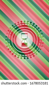 icono del reloj de arena dentro de la insignia de estilo navideño...