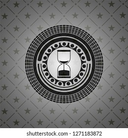 sand clock icon inside dark emblem. Retro