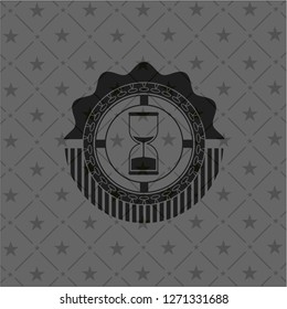 sand clock icon inside dark badge or emblem
