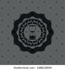 sand clock icon inside dark badge or emblem