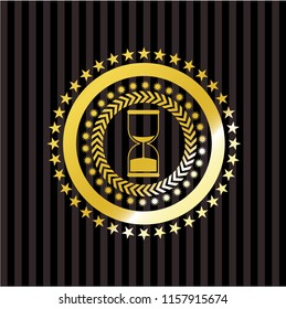 sand clock icon inside golden emblem or badge