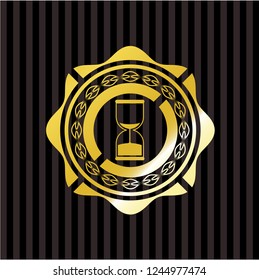 sand clock icon inside golden emblem