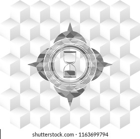 sand clock icon inside grey icon or emblem with geometric cube white background