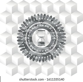 sand clock icon inside grey badge with geometric cube white background