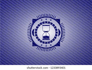 sand clock icon inside jean background
