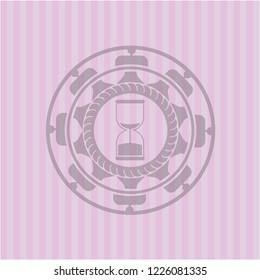 sand clock icon inside pink icon or emblem
