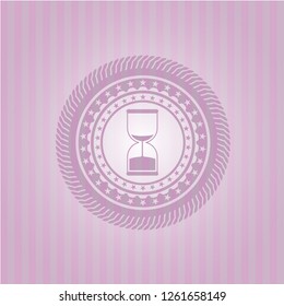 sand clock icon inside pink icon or emblem