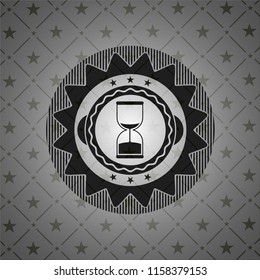 sand clock icon inside realistic black emblem