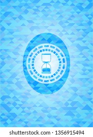 sand clock icon inside realistic sky blue emblem. Mosaic background