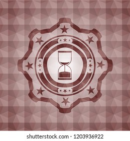 sand clock icon inside red seamless badge with geometric background.