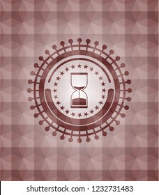 sand clock icon inside red seamless polygonal badge.