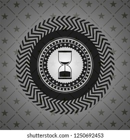 sand clock icon inside retro style black emblem