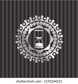 sand clock icon inside silvery shiny badge