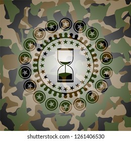 sand clock icon on camo pattern