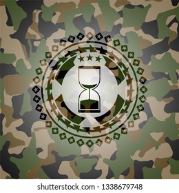sand clock icon on camo texture