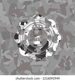 sand clock icon on grey camo texture