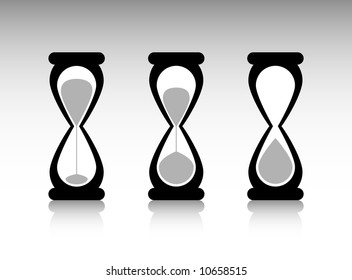 Sand falling in the hourglass.