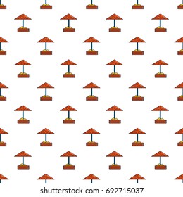 Sandbox with red dotted umbrella nie pattern in cartoon style. Seamless pattern vector illustration