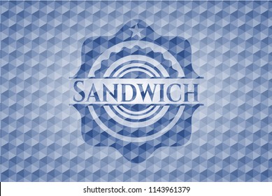 Sandwich blue badge with geometric background.