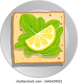 Sandwich with greens and lemon slice on a plate